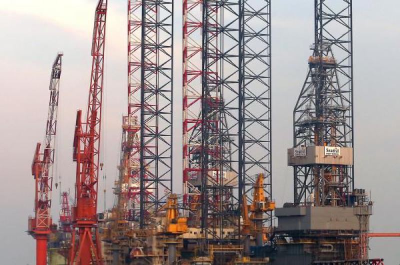 鉴于油价波动，西班牙能源公司雷普索尔采取保守的态度